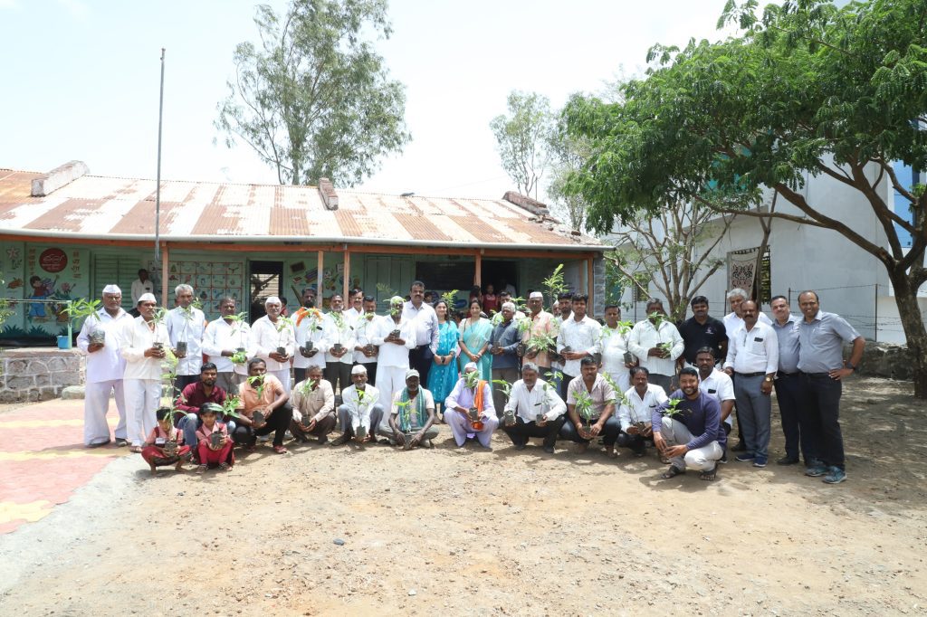 Tree plantation program in action, showcasing Optima Life Science's commitment to environmental sustainability and community conservation efforts.